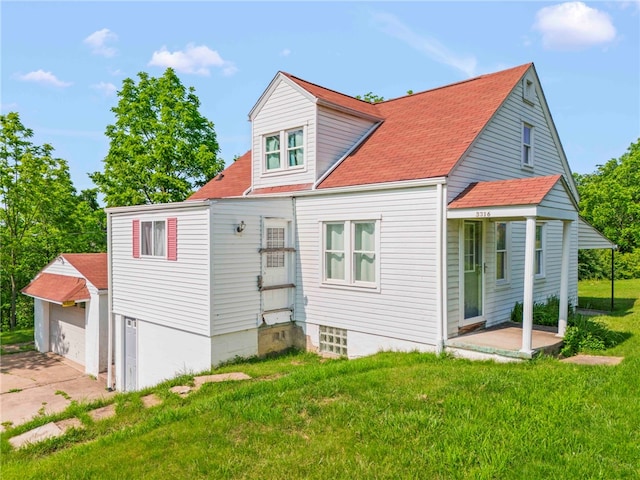 3316 Evans Dr, South Park, PA 15332 - rear view of house featuring a yard, concrete driveway, and roof with shingles