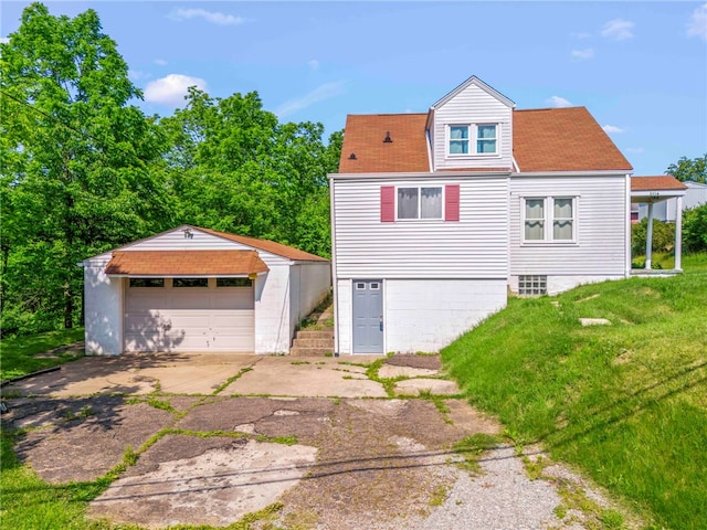 3316 Evans Dr, South Park, PA 15332 - view of front of property featuring a detached garage, an outdoor structure, and a front lawn