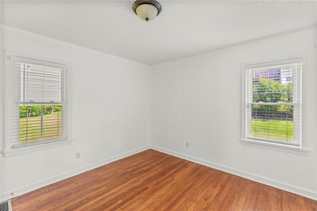 3316 Evans Dr, South Park, PA 15332 - spare room featuring plenty of natural light, wood finished floors, and baseboards