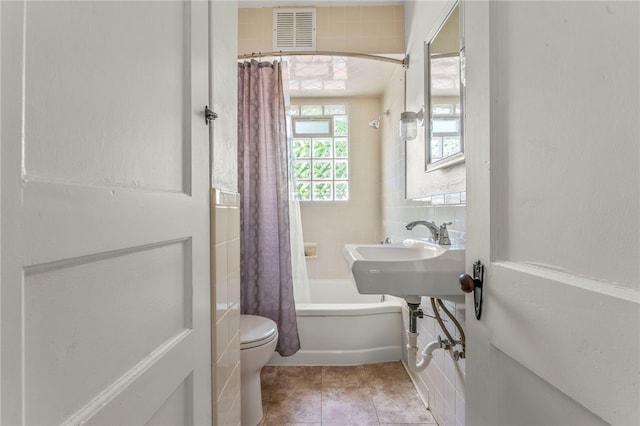 3316 Evans Dr, South Park, PA 15332 - full bathroom with shower / bath combo with shower curtain, toilet, and tile patterned floors