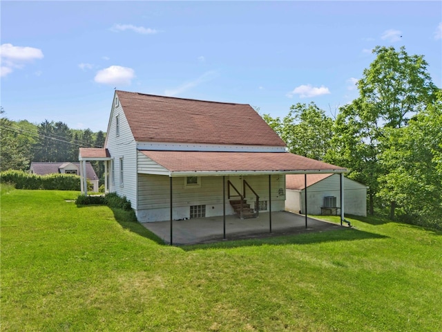 3316 Evans Dr, South Park, PA 15332 - rear view of property featuring a lawn, a patio, roof with shingles, and central AC unit