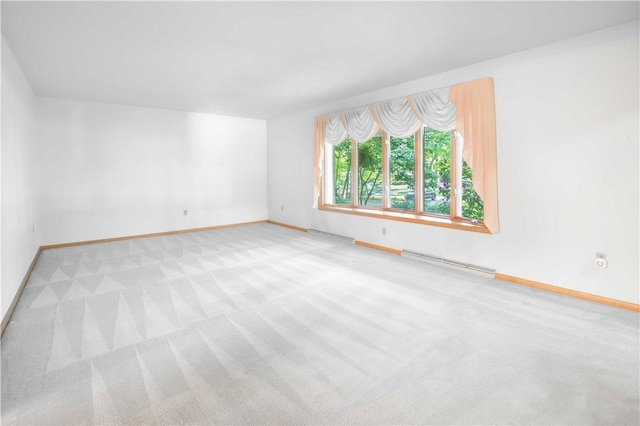 3460 Ridgewood Dr, Hermitage, PA 16148 - unfurnished room with a baseboard heating unit, baseboards, and light carpet