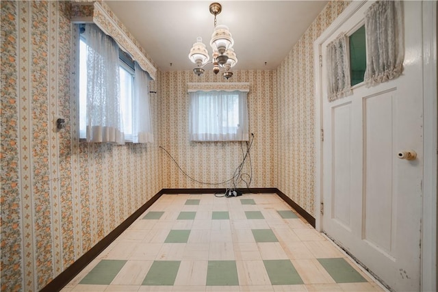612 Highview Rd, Baldwin Twp, PA 15234 - corridor with tile patterned floors, a chandelier, wallpapered walls, and baseboards