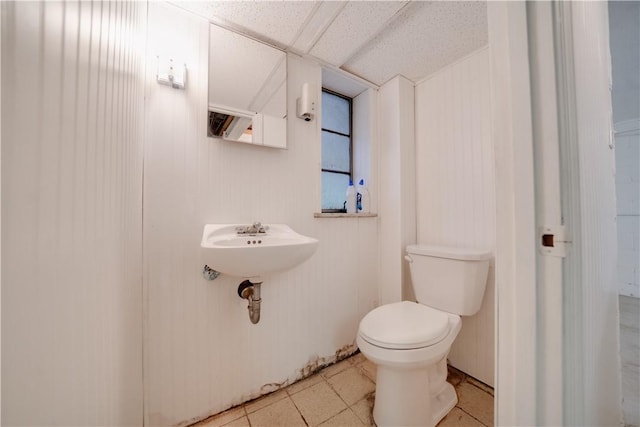 612 Highview Rd, Baldwin Twp, PA 15234 - half bath featuring toilet and tile patterned floors