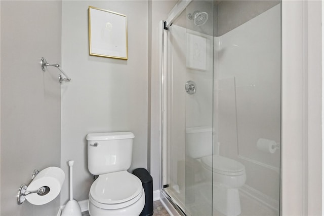 901 Montclair Dr, Moon/Crescent Twp, PA 15108 - bathroom featuring toilet, a stall shower, and baseboards