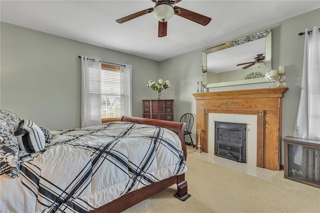 1201 Carlisle St, Natrona Hts/Harrison Twp, PA 15065 - tiled bedroom featuring a tiled fireplace, carpet floors, and ceiling fan