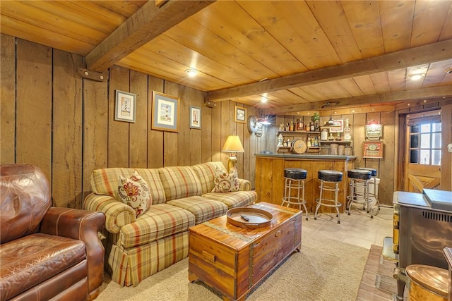 1201 Carlisle St, Natrona Hts/Harrison Twp, PA 15065 - living area with a bar, wooden ceiling with exposed beams, wood walls, and light tile patterned flooring