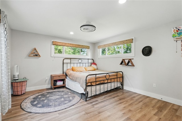 118 Eakin Ave, Ross Twp, PA 15214 - bedroom featuring multiple windows, wood finished floors, baseboards, and recessed lighting