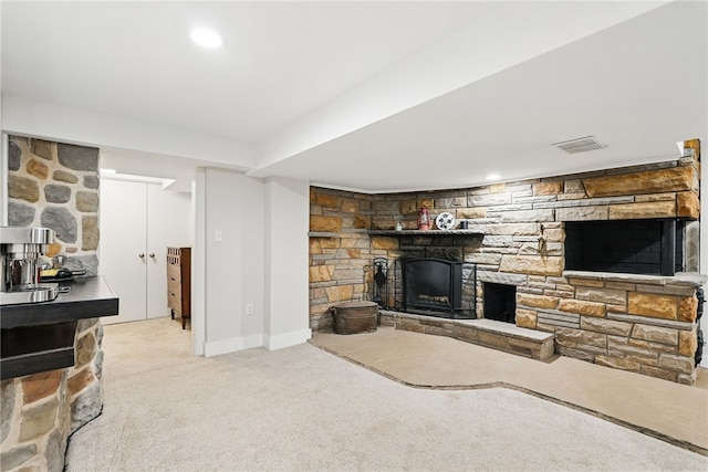118 Eakin Ave, Ross Twp, PA 15214 - carpeted living area with a stone fireplace and baseboards