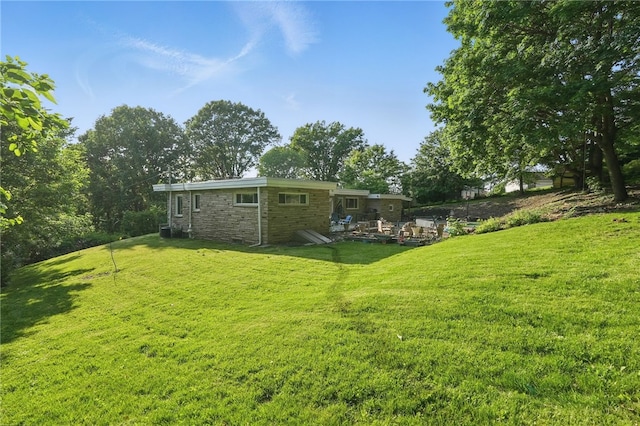 118 Eakin Ave, Ross Twp, PA 15214 - back of house featuring a lawn and stone siding