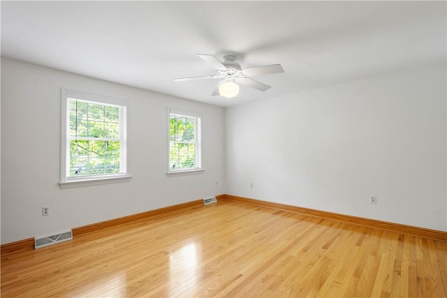 511 Clubview Dr, Peters Twp, PA 15317 - spare room featuring light wood finished floors, baseboards, and a ceiling fan