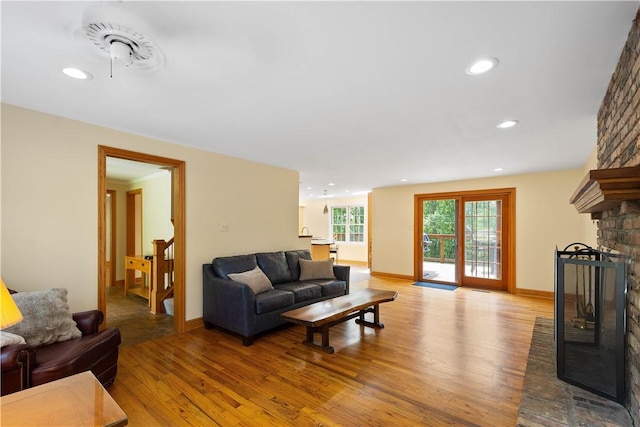 511 Clubview Dr, Peters Twp, PA 15317 - living room featuring a large fireplace, wood finished floors, recessed lighting, and baseboards
