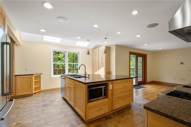 511 Clubview Dr, Peters Twp, PA 15317 - kitchen featuring stainless steel appliances, a sink, wall chimney exhaust hood, healthy amount of natural light, and recessed lighting