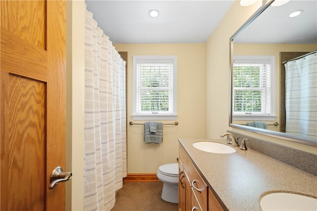 511 Clubview Dr, Peters Twp, PA 15317 - full bath featuring healthy amount of natural light, toilet, double vanity, tile patterned flooring, and recessed lighting