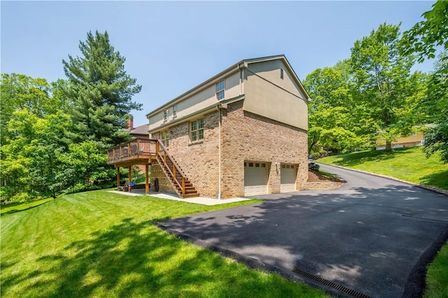 511 Clubview Dr, Peters Twp, PA 15317 - view of side of property featuring a garage, asphalt driveway, stairway, a deck, and a lawn