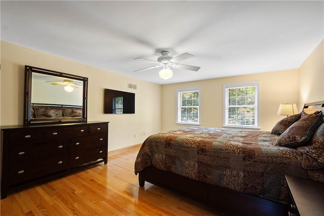 511 Clubview Dr, Peters Twp, PA 15317 - bedroom with light wood finished floors, a ceiling fan, and baseboards
