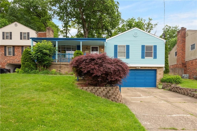 1064 Glen Oak Dr, Bethel Park, PA 15102 - tri-level home featuring a garage, a front yard, and driveway