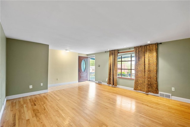 1064 Glen Oak Dr, Bethel Park, PA 15102 - empty room with light wood finished floors, baseboards, and recessed lighting