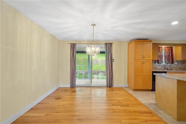1064 Glen Oak Dr, Bethel Park, PA 15102 - unfurnished dining area with a chandelier, light wood finished floors, and recessed lighting