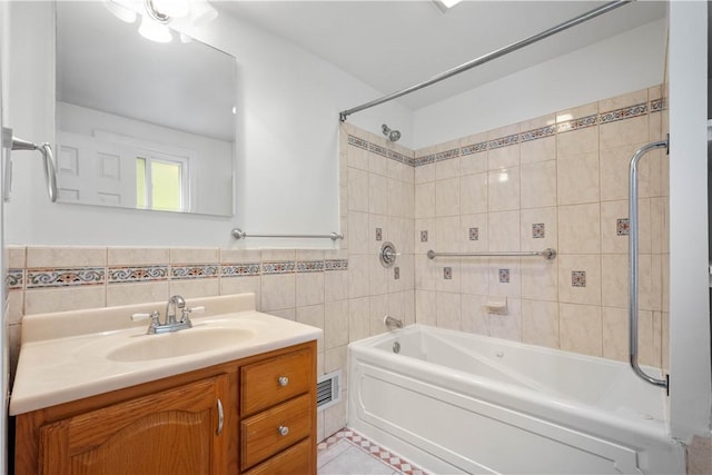 1064 Glen Oak Dr, Bethel Park, PA 15102 - full bath with tile walls, tub / shower combination, and vanity