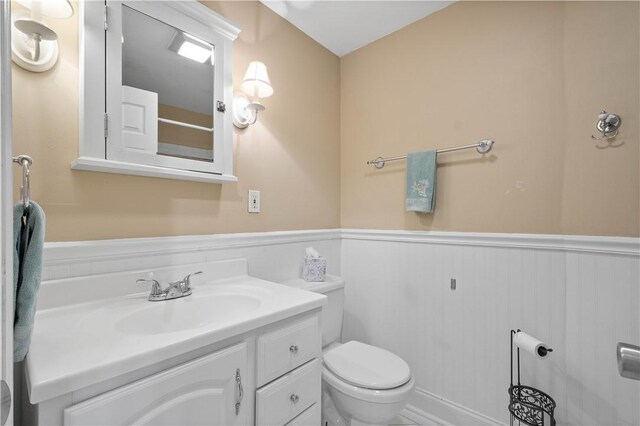 1064 Glen Oak Dr, Bethel Park, PA 15102 - bathroom with a wainscoted wall and vanity