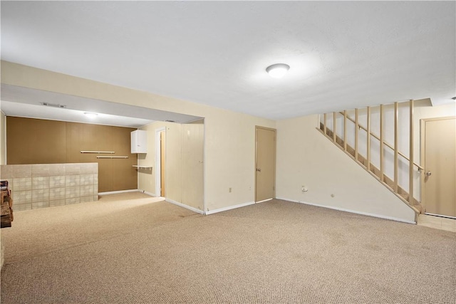 1064 Glen Oak Dr, Bethel Park, PA 15102 - finished below grade area featuring light carpet and stairs