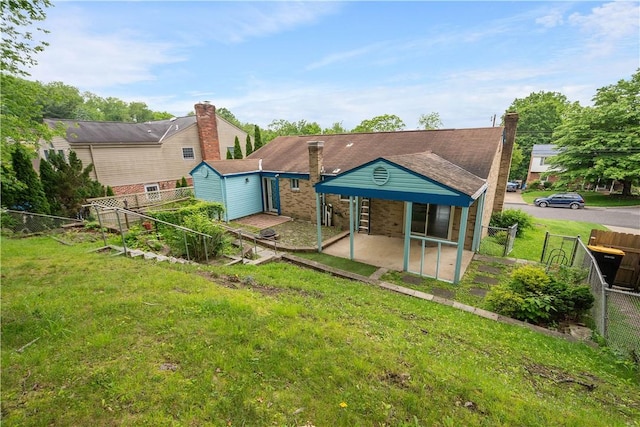1064 Glen Oak Dr, Bethel Park, PA 15102 - rear view of property featuring a patio area and an outbuilding