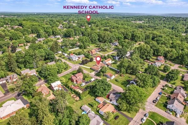 260 S Oakdale Ave, Hermitage, PA 16148 - aerial overview of property's location with a forest