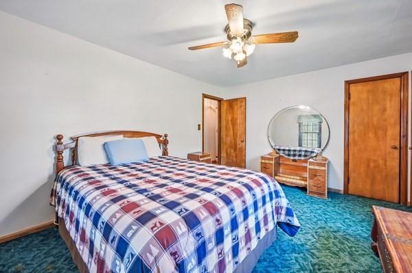 260 S Oakdale Ave, Hermitage, PA 16148 - carpeted bedroom with ceiling fan and baseboards