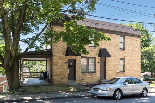 2419 Wenzell Ave, Beechview, PA 15216 - view of front of property with brick siding, entry steps, and roof with shingles