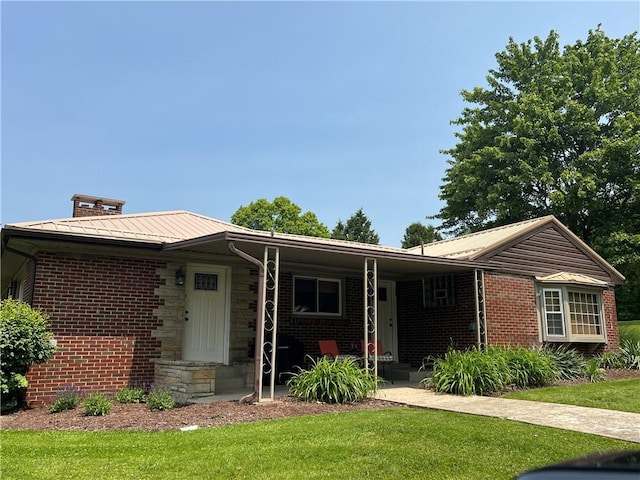 2617 S Hermitage Rd, Hermitage, PA 16148 - ranch-style house featuring a front lawn, metal roof, brick siding, and stone siding