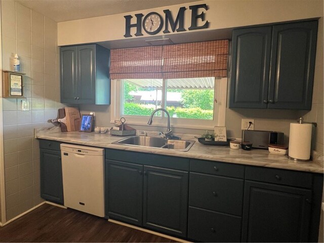 2617 S Hermitage Rd, Hermitage, PA 16148 - kitchen with dishwasher, a sink, dark wood finished floors, light countertops, and tile walls