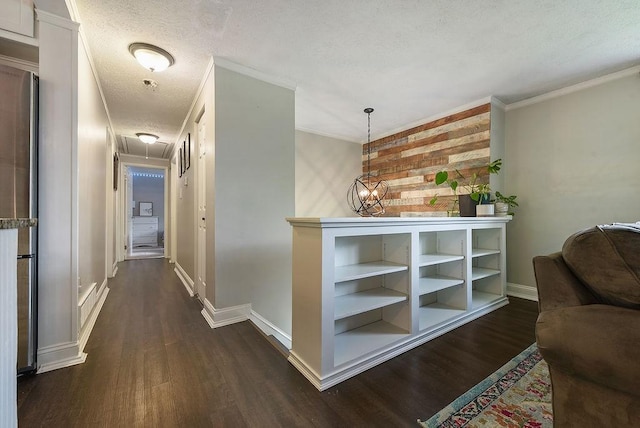 504 Diablo Dr, Bethel Park, PA 15102 - corridor with dark wood-style floors, attic access, baseboards, crown molding, and a textured ceiling