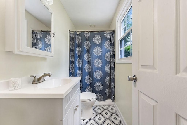 504 Diablo Dr, Bethel Park, PA 15102 - bathroom with vanity, toilet, baseboards, tile patterned flooring, and curtained shower
