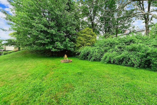 504 Diablo Dr, Bethel Park, PA 15102 - view of grassy yard with an outdoor fire pit