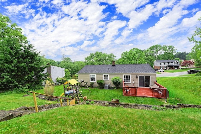 504 Diablo Dr, Bethel Park, PA 15102 - rear view of house featuring a wooden deck, cooling unit, a playground, and a lawn