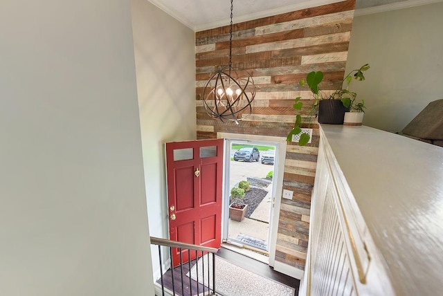 504 Diablo Dr, Bethel Park, PA 15102 - foyer entrance with wood walls, a chandelier, and crown molding