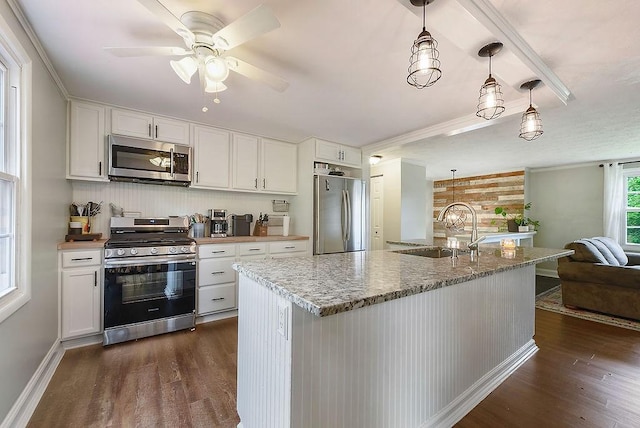 504 Diablo Dr, Bethel Park, PA 15102 - kitchen with stainless steel appliances, a sink, dark wood finished floors, a ceiling fan, and white cabinets