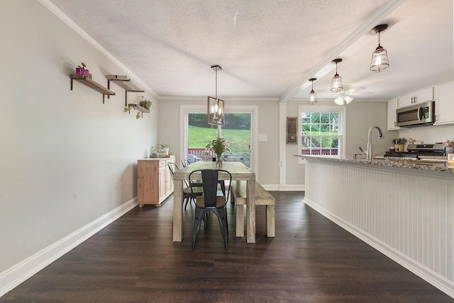 504 Diablo Dr, Bethel Park, PA 15102 - dining area featuring a textured ceiling, crown molding, dark wood-style floors, baseboards, and a ceiling fan