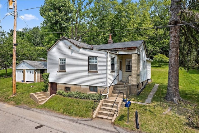 104 W Rd, Shaler, PA 15209 - view of front of house with a front yard and a chimney