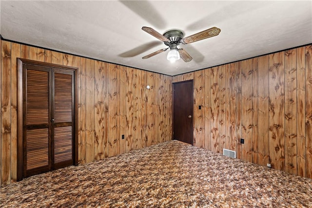 104 W Rd, Shaler, PA 15209 - unfurnished room with a ceiling fan and wooden walls