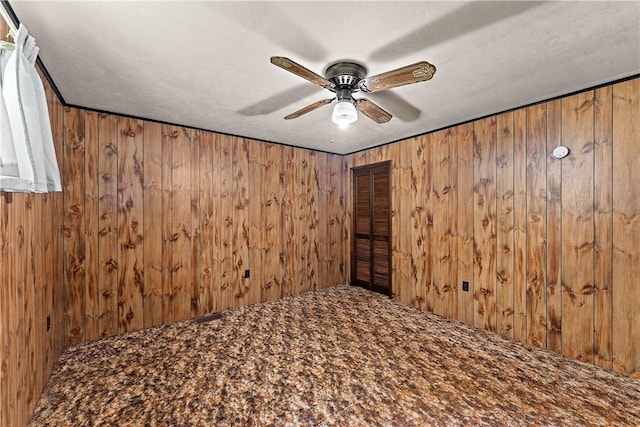 104 W Rd, Shaler, PA 15209 - carpeted empty room with ceiling fan and wooden walls
