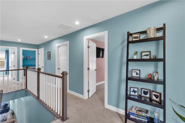 121 Derby Ln, North Fayette, PA 15071 - hall featuring an upstairs landing, carpet, recessed lighting, and baseboards
