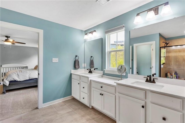 121 Derby Ln, North Fayette, PA 15071 - ensuite bathroom with vanity, a ceiling fan, a tile shower, tile patterned flooring, and baseboards