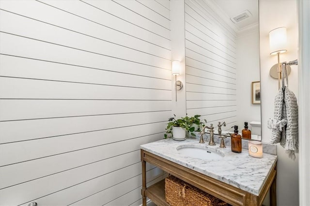 506 Ridge Ct, Pine Twp Nal, PA 15090 - bathroom with vanity, wood walls, and ornamental molding
