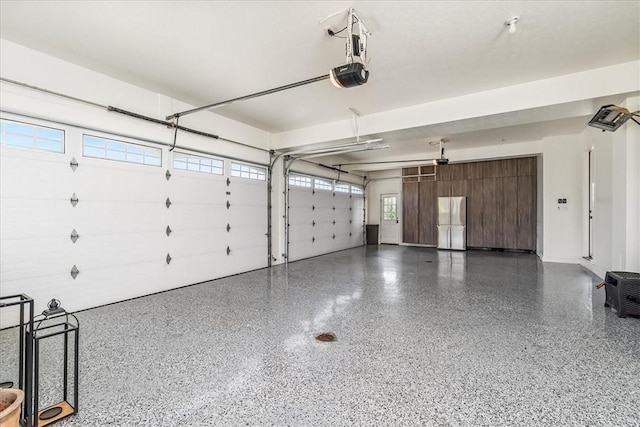 506 Ridge Ct, Pine Twp Nal, PA 15090 - garage featuring a garage door opener and freestanding refrigerator