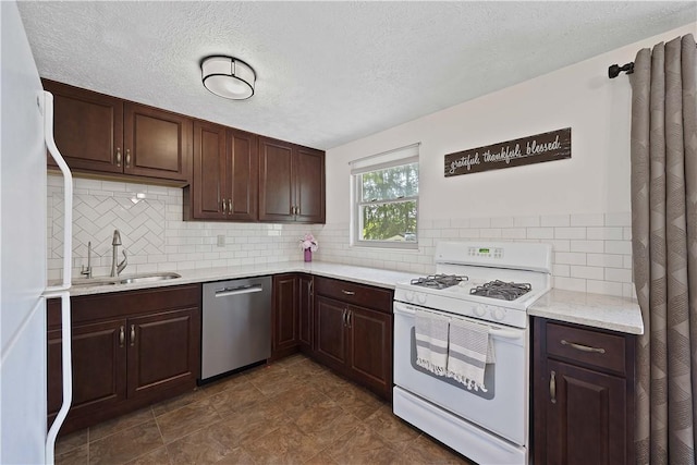119 Summit Ridge Dr, Bridgeville, PA 15017 - kitchen with white appliances, a sink, backsplash, dark brown cabinetry, and a textured ceiling