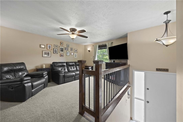 119 Summit Ridge Dr, Bridgeville, PA 15017 - carpeted living area with a ceiling fan and a textured ceiling