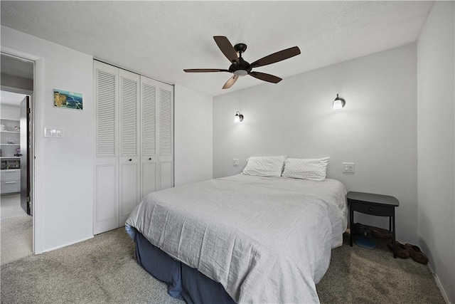 119 Summit Ridge Dr, Bridgeville, PA 15017 - bedroom with carpet flooring, a closet, a ceiling fan, and baseboards