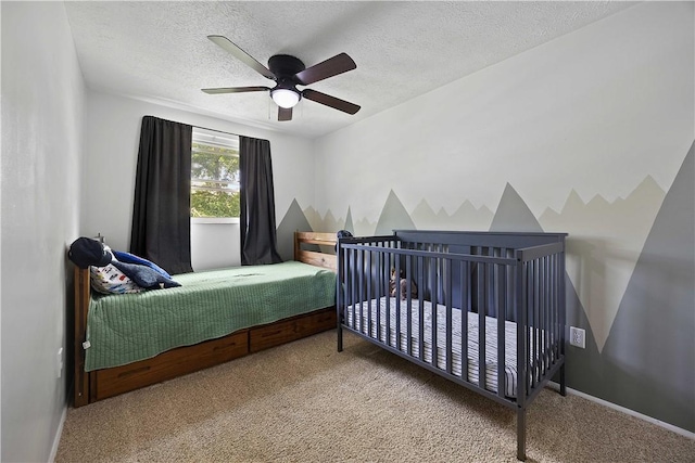 119 Summit Ridge Dr, Bridgeville, PA 15017 - carpeted bedroom featuring a textured ceiling and a ceiling fan